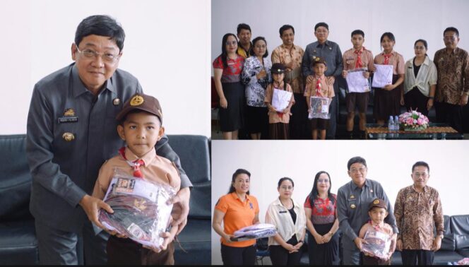 
					Bupati Toraja Utara, Frederik Victor Palimbong serahkan seragam Gratis kepada siswa sekolah dasar dan sekolah menengah pertama di Toraja Utara, Jumat (28/11/2025). Foto: Istimewa