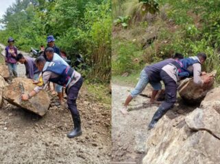 Bhabinkamtibmas Polres Tana Toraja bergerak cepat membersihkan material longsor di Kecamatan Rano. Foto: Istimewa